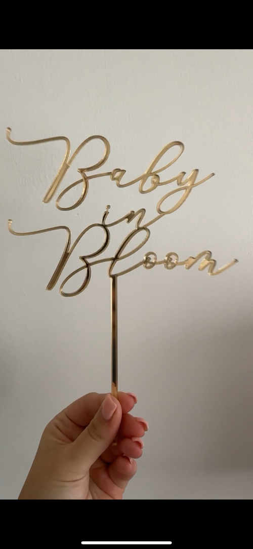 Baby in bloom cake topper