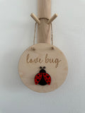 Love bug wall sign
