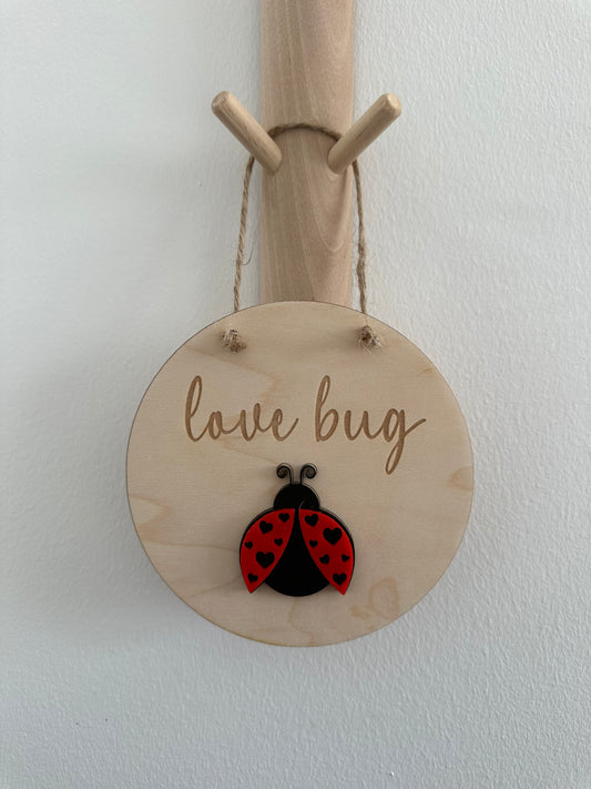 Love bug wall sign